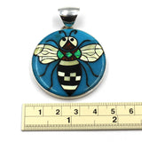 Inlay bee pendant by Kelly Charveaux