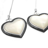 Mother of pearl inlay heart earrings by Kelly Charveaux