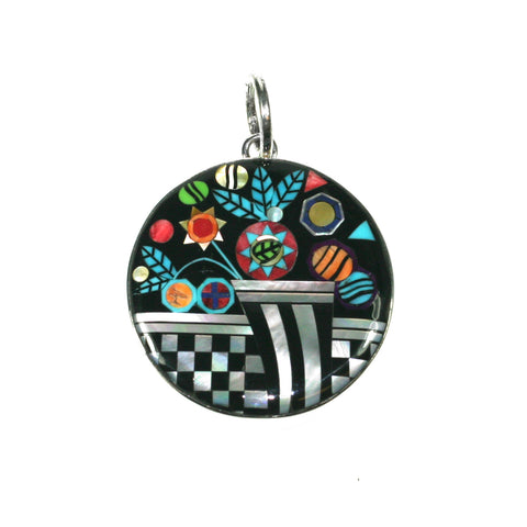 Flower inlay pendant by Kelly Charveaux