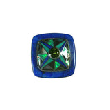 Inlay peridot ring by Kelly Charveaux
