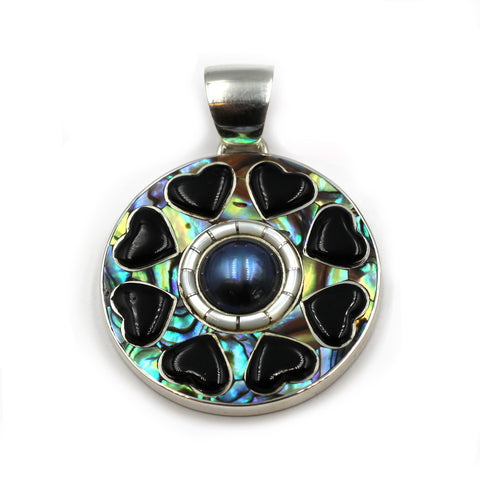 inlay jewelry pendant by Kelly Charveaux