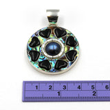 Inlay jewelry pendant by Kelly Charveaux